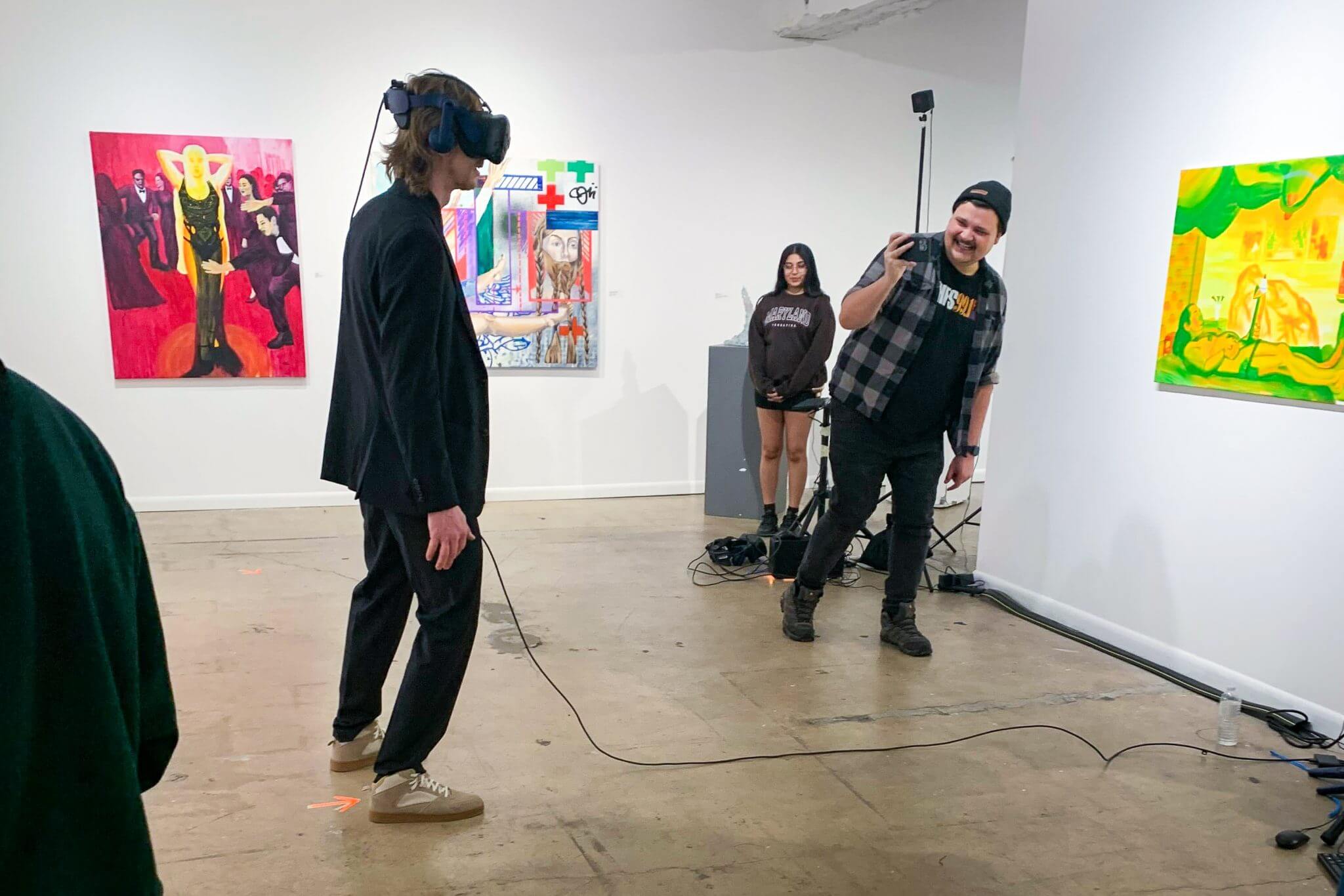 Kirk Kubicek experiences The North Country's virtual reality music video at the Culture House DC on March 29, 2024. (Matt Kauffman/The Diamondback)